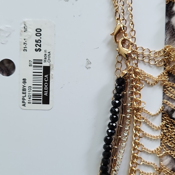 A gold tone Aldo chocker set of 3 with the original packaging - Picture 4 of 5